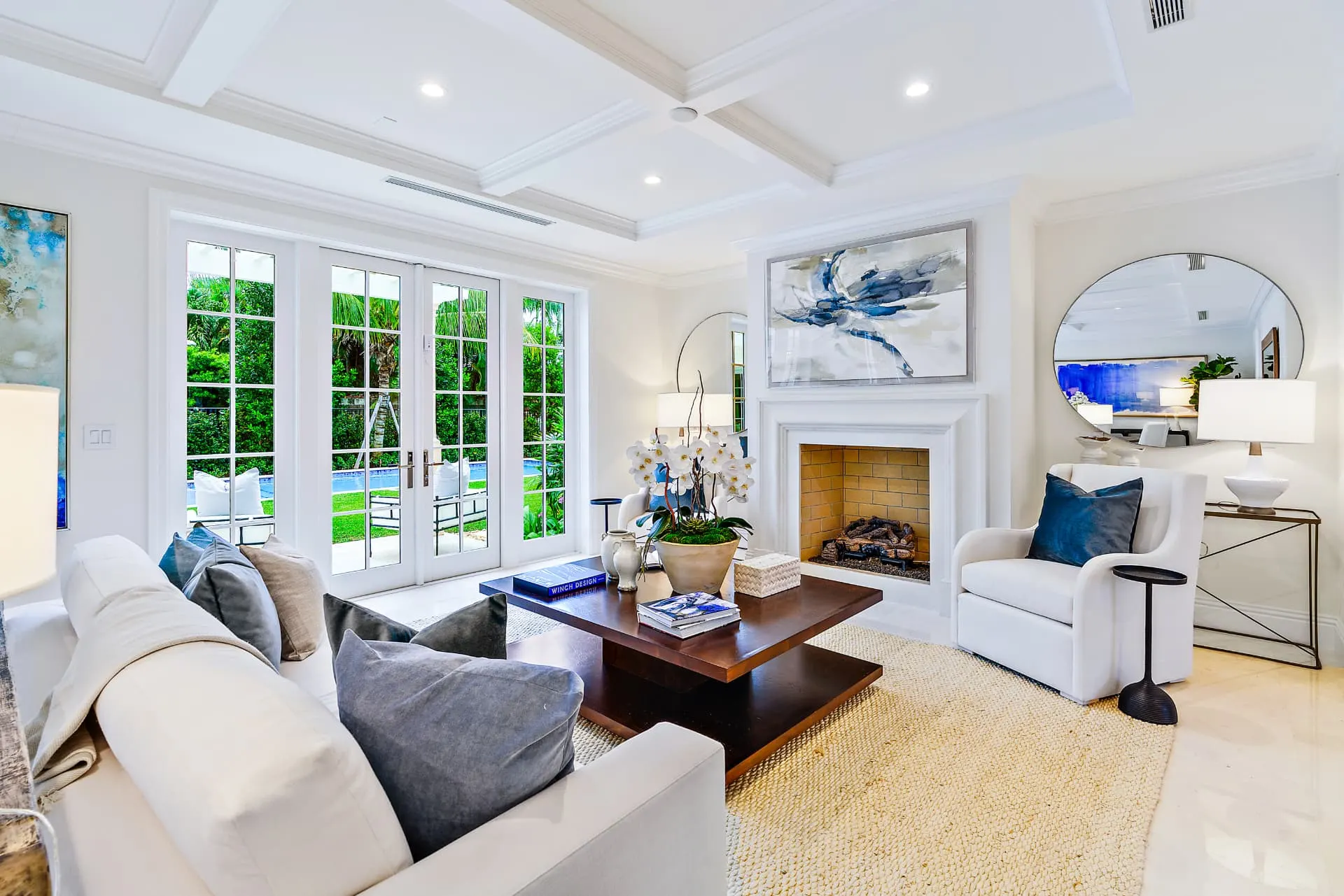 211 Ocean Terrace living room with coffered ceiling and fireplace